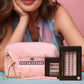 Model holding the Kemp Beauty Max Performance Lash Kit travel pouch