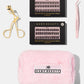 Kemp Beauty Performance Kit contents: two boxes of pre-glued lash clusters, eyelash curler, applicator tool, and travel bag