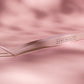 Kemp Beauty applicator tweezer tool styled on satin